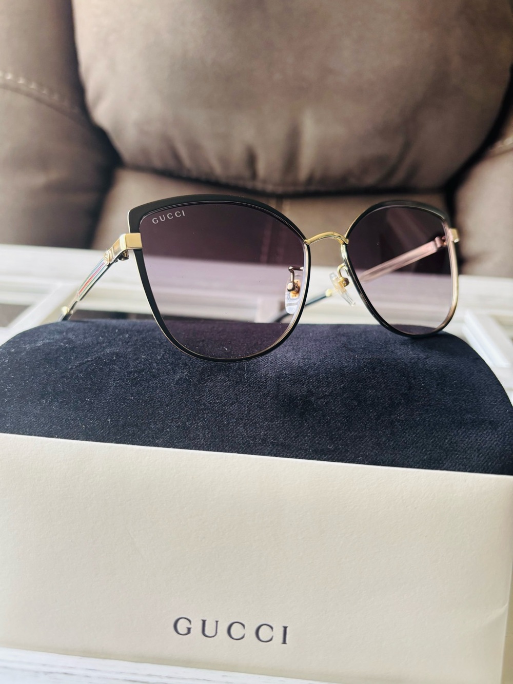 Gucci Women's Black & Gold Cat-Eye Sunglasses. Gradient Lenses. Full inclusion.